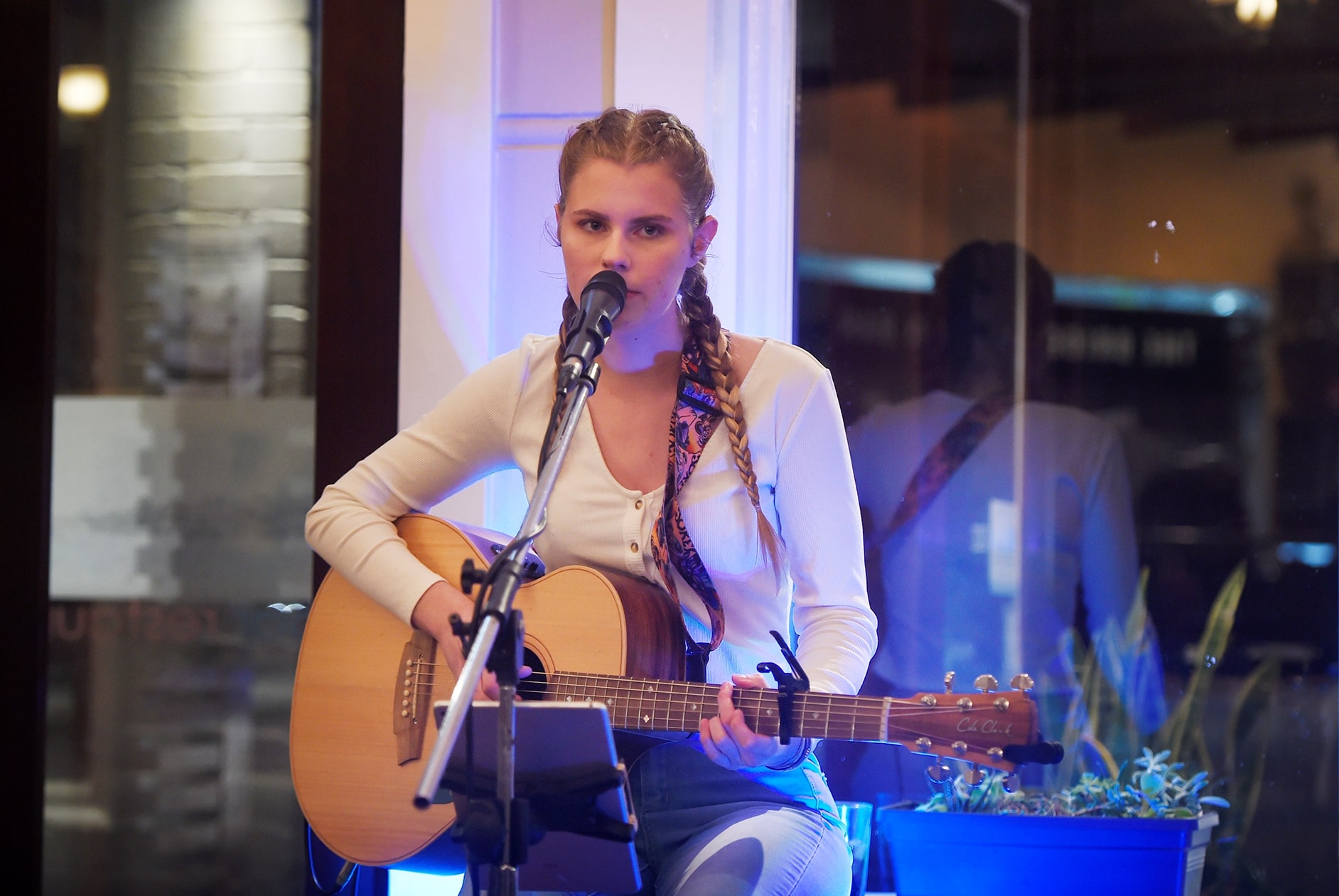 Solo female acoustic musician.