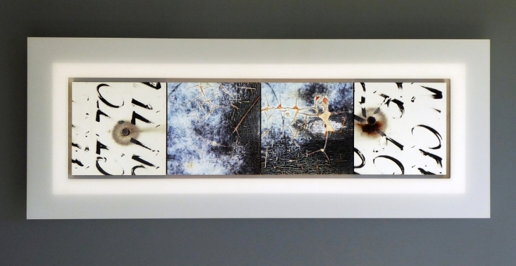 Long encaustic artwork in a frame