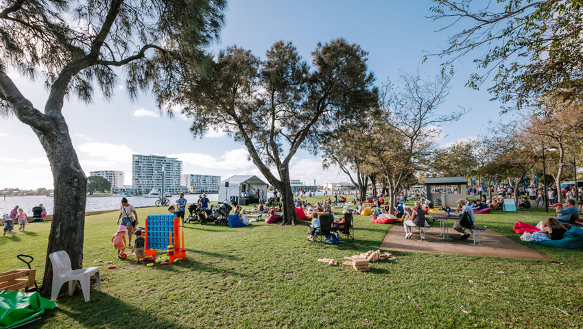 Mandurah Easter weekend with people on the foreshore with events and picnics
