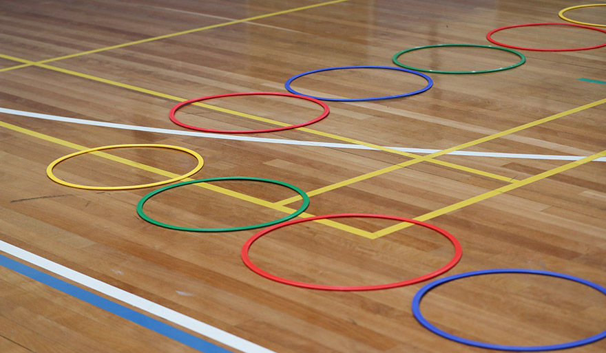 Gym court with lines and hoops