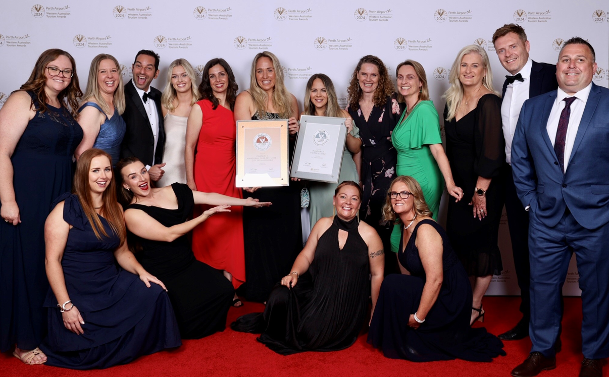 Staff from Visit Mandurah and City of Mandurah in a group photo with award