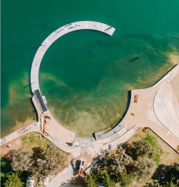 Bird's eye view of circular estuary pool under construction 