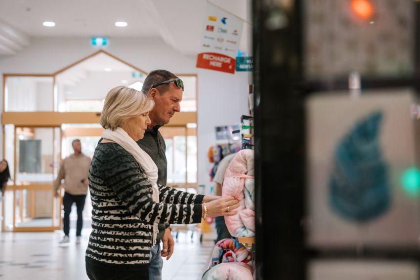 man and woman shopping