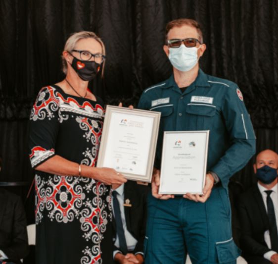 2022 Community Citizen of the Year Award winner Jeremy Anderberg stands alongside Dawesville MLA Lisa Munday at the Australia Day ceremony.