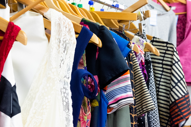 Different clothing hung up on a rack