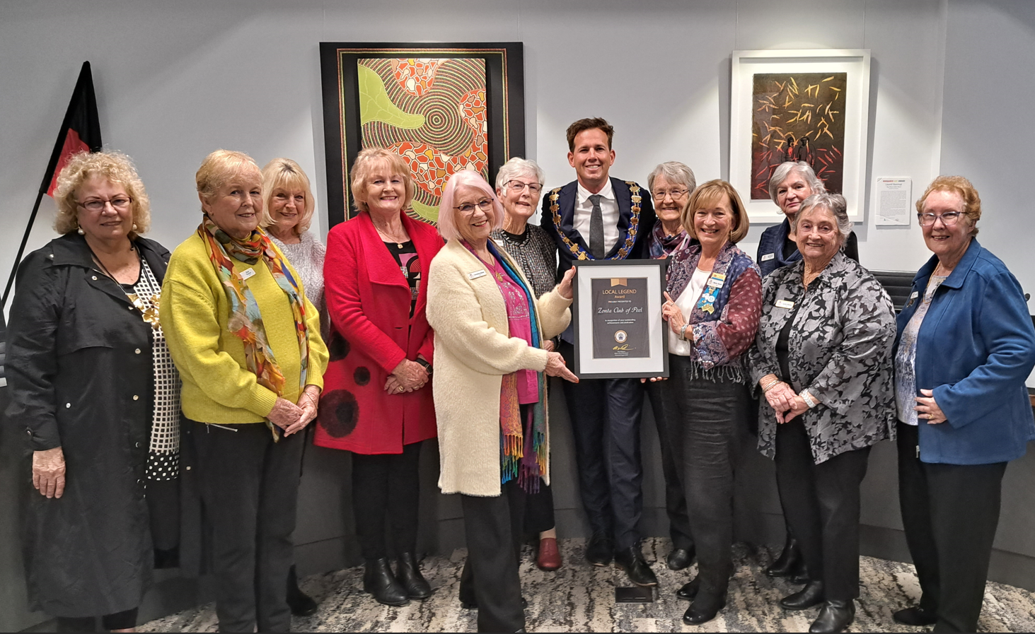 Zonta Peel members hold their Local Legend award with Mayor Rhys Williams in centre