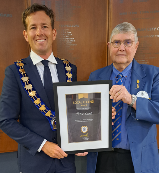 Mayor Rhys Williams and Peter Lamb with award, smiling at camera