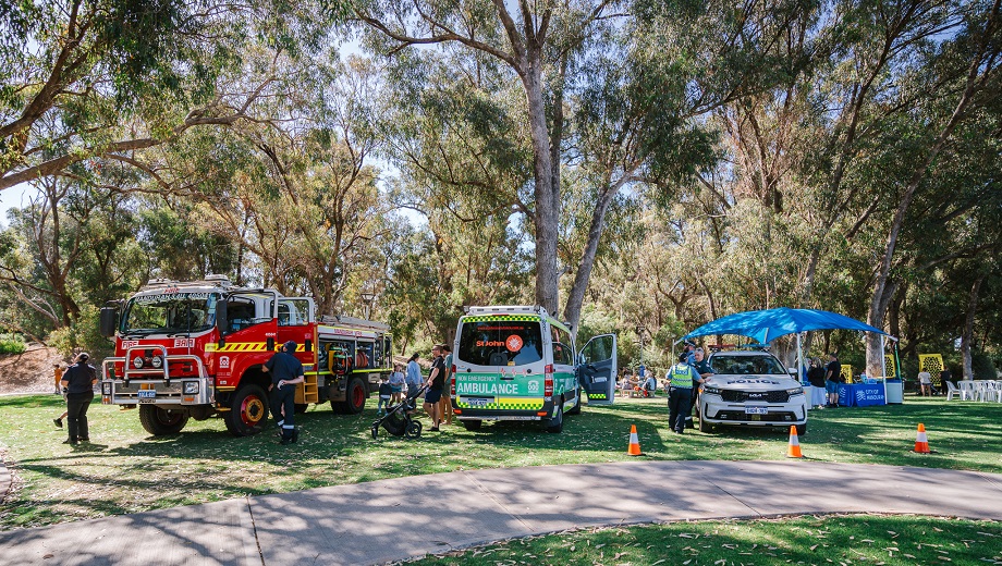 Fire Truck, Ambulance and Police Car at a Community Event