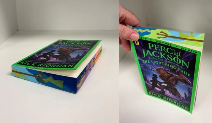 A Percy Jackson novel with it's edges painted.